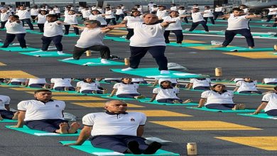 Photo of Defence Minister Rajnath Singh and Chief of Naval Staff Admiral R Harikumar joined naval and defence personnel onboard INS Vikrant for International Day of Yoga celebrations at Cochin Shipyard