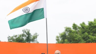 Photo of HM Amit Shah hoists national flag at his residence